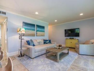 Open Living Room with Flat Screen T.V.